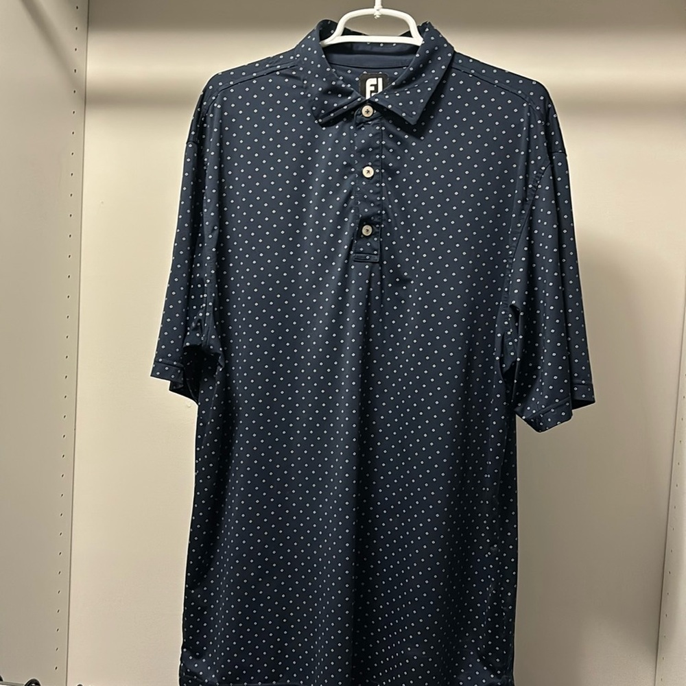 Footjoy golf polo. Size Large. Blue with white diamonds.
